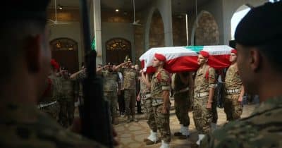 Israel warns of retaliation against Hezbollah stronghold if attacked