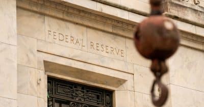 Wall Street sinks on bets Fed will hike rates this year