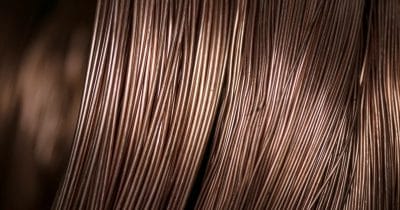 Copper holds losses as stronger dollar and hawkish Fed weigh on demand