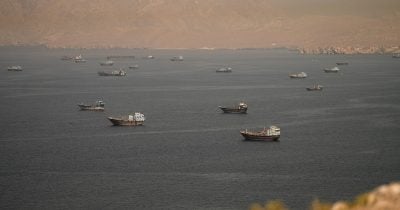 Iranian drones attack Bahrain, tanker hit in Strait of Hormuz escalation