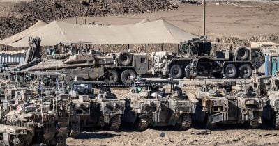 Tactical vehicles arrive at ISF base near Gaza for peacekeeping deployment