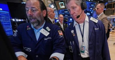 Dow heads for new record as S&P 500 and Nasdaq fall on tech rotation
