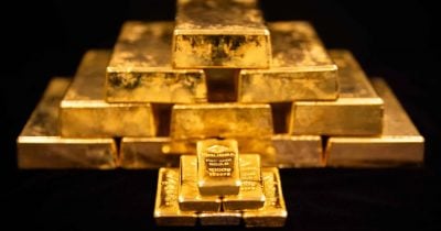 Gold falls as US-Iran strikes boost oil prices, Fed rate hike expected