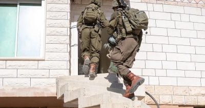 Israeli forces detain 14 suspects in explosive materials probe in Judea, Samaria