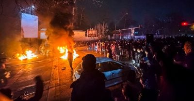 Iranian agents deploy tear gas at Tehran protest over truck purchase losses