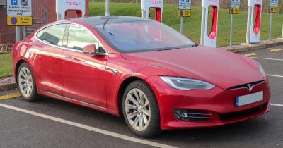 Tesla’s automotive engine faces strain as Musk pivots beyond cars
