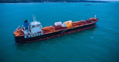 Explosions reported near Oman tanker, crew safe, no damage