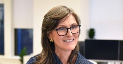 Cathie Wood highlights AI token price collapse as demand surges in ‘virtuous cycle’
