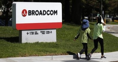 Broadcom drags Nasdaq lower as Dow and S&P 500 climb to new highs